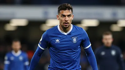 Millwall Football Club's midweek Championship fixture against Wrexham ended in a draw at The Den, a match captured in...