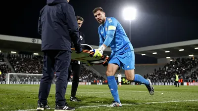 Chelsea goalkeeper Emi Martinez was stretchered off and taken to hospital after a collision during his side's 2-0 Premier...